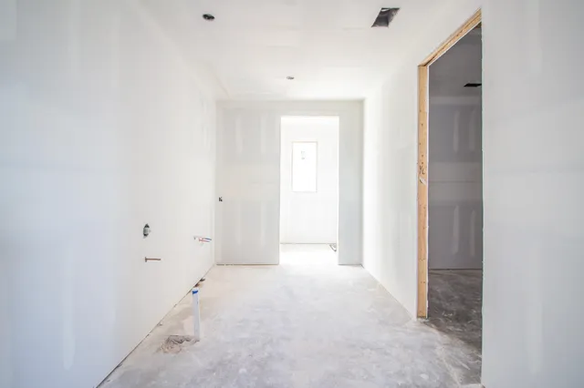 a bathroom with a sink and a window