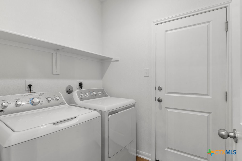 8114 Timber Hollow Lane Temple, TX 76502 - Photo 21 of 34 a utility room with dryer and washer