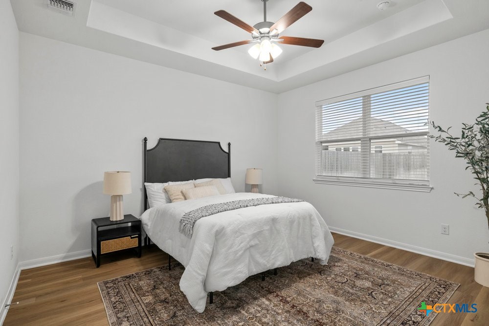 8114 Timber Hollow Lane Temple, TX 76502 - Photo 22 of 34 a bedroom with a bed and a window
