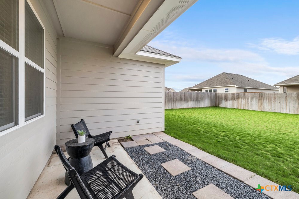 8114 Timber Hollow Lane Temple, TX 76502 - Photo 30 of 34 a view of a backyard with a garden