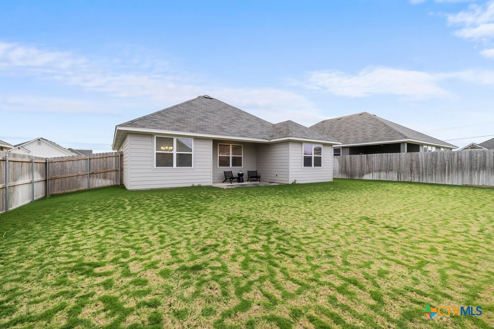 8114 Timber Hollow Lane Temple, TX 76502 - Photo 31 of 34 a view of a house with a garden and yard