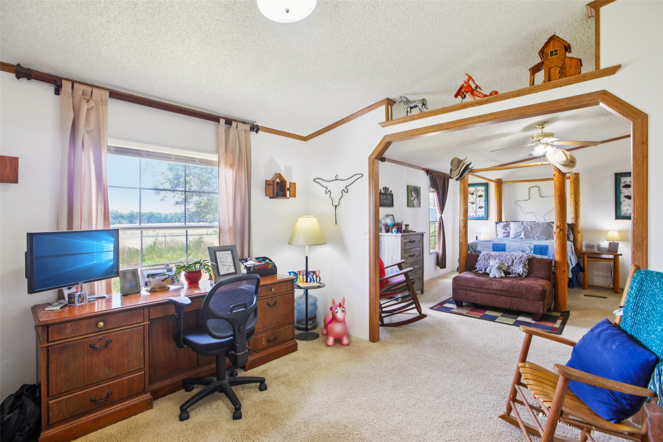 372 Hofferek Road Rosanky, TX 78953 - Photo 14 of 40 a view of a workspace with furniture and a window