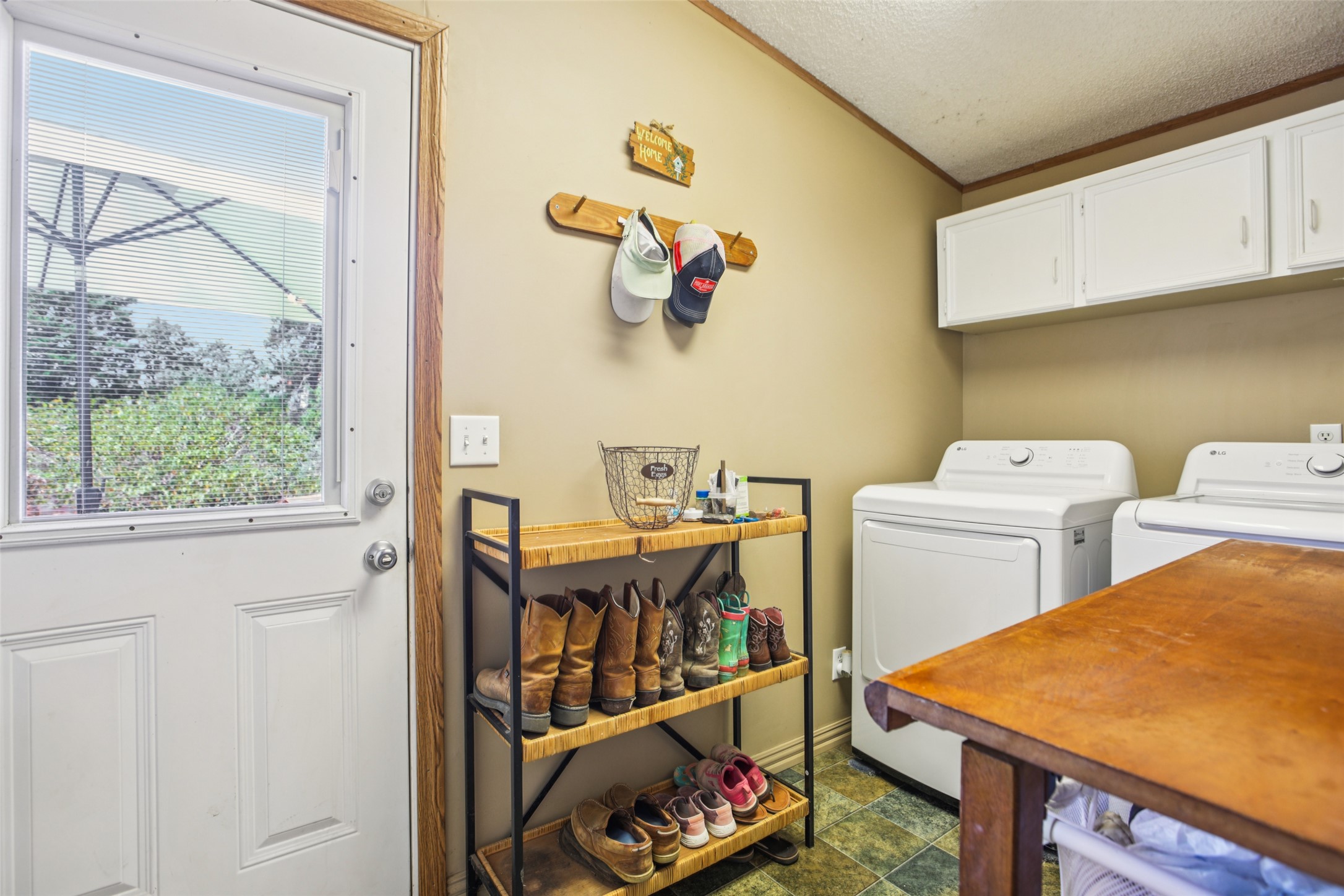 372 Hofferek Road Rosanky, TX 78953 - Photo 23 of 40 a room with storage and utility
