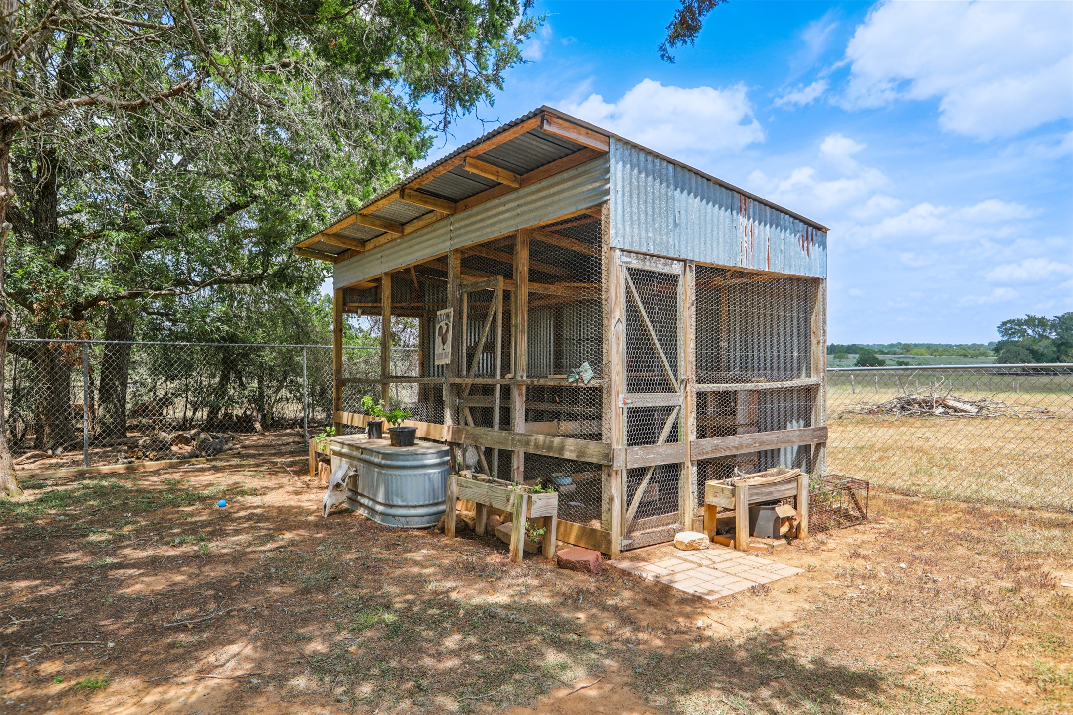 372 Hofferek Road Rosanky, TX 78953 - Photo 27 of 40 a front view of a house with garden