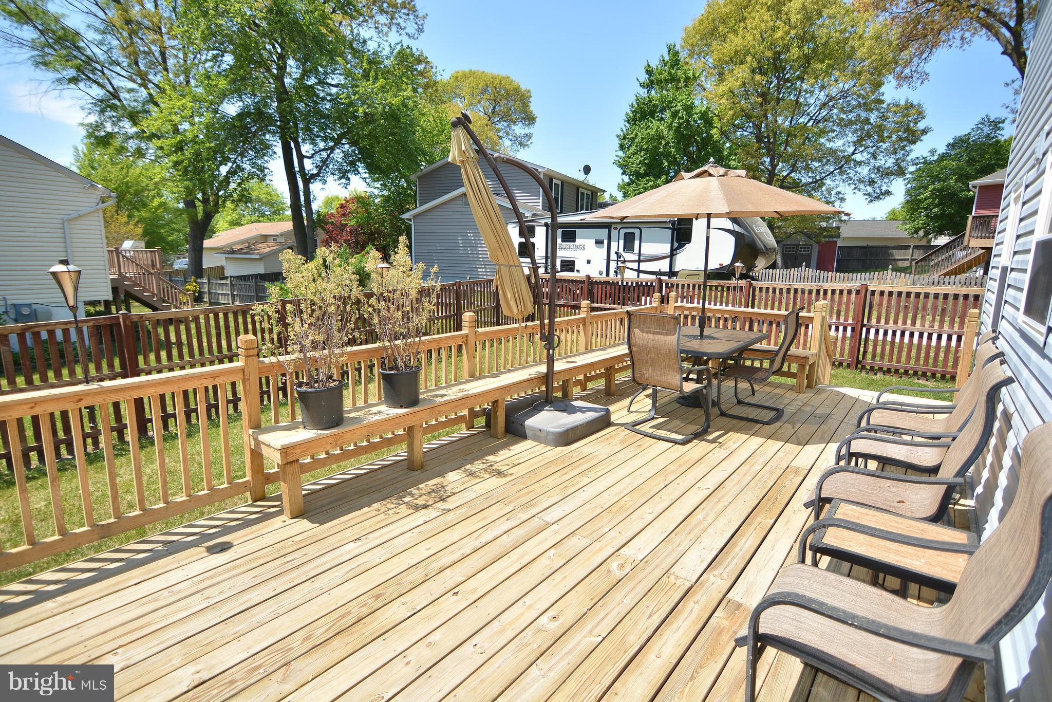 2899 Dungate Road Pasadena, MD 21122 - Photo 22 of 30 Outdoor entertaining is a breeze on this deck