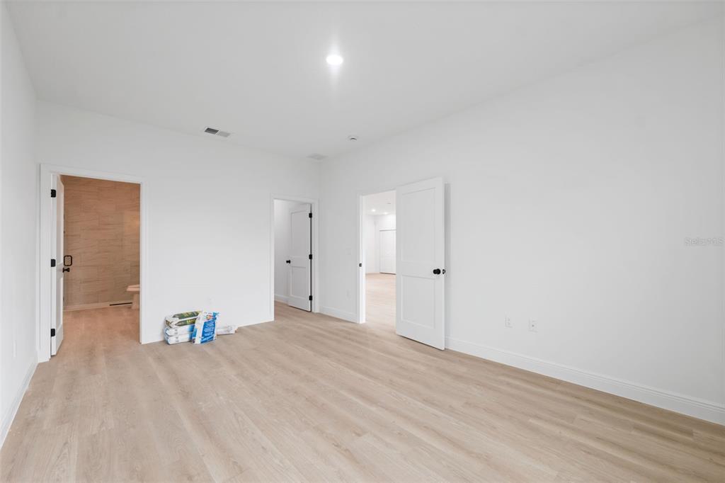 3261 Southwest 129th Loop Ocala, FL 34473 - Photo 18 of 32 a view of empty room with wooden floor