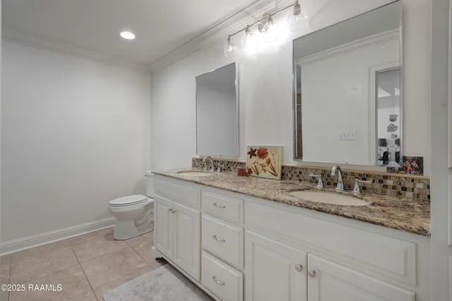 $720,000 | 105 Quiet Oaks Drive, Youngsville, LA 70592