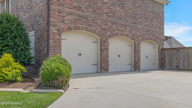 $720,000 | 105 Quiet Oaks Drive, Youngsville, LA 70592