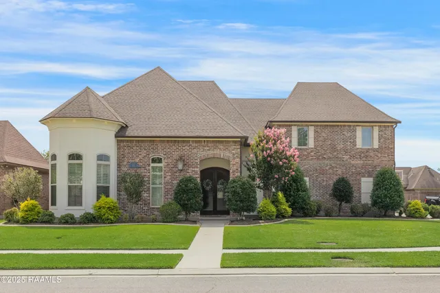 $720,000 | 105 Quiet Oaks Drive, Youngsville, LA 70592