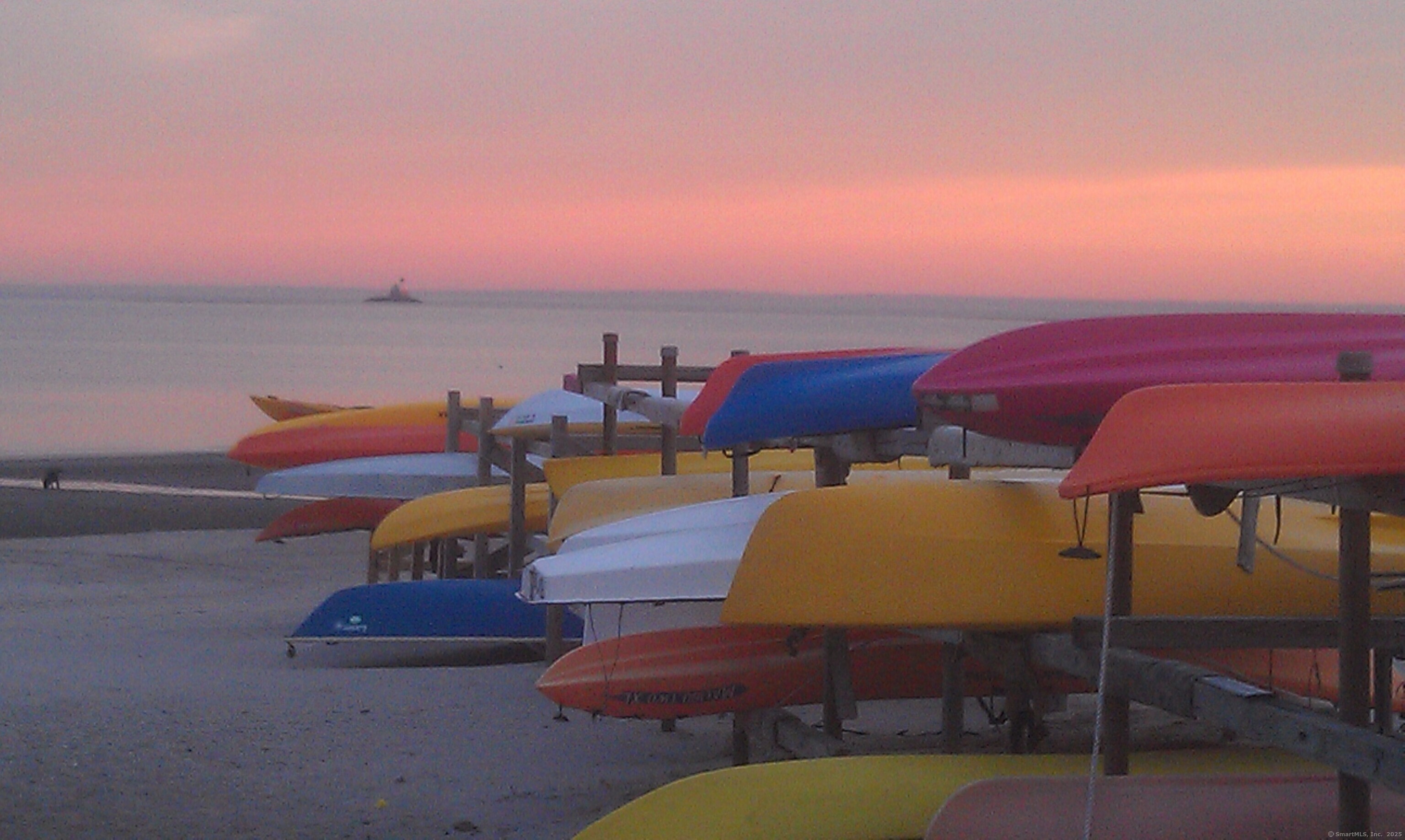 127 Paul Place Fairfield, CT 06824 - Photo 39 of 40 Kayak racks at sunset.