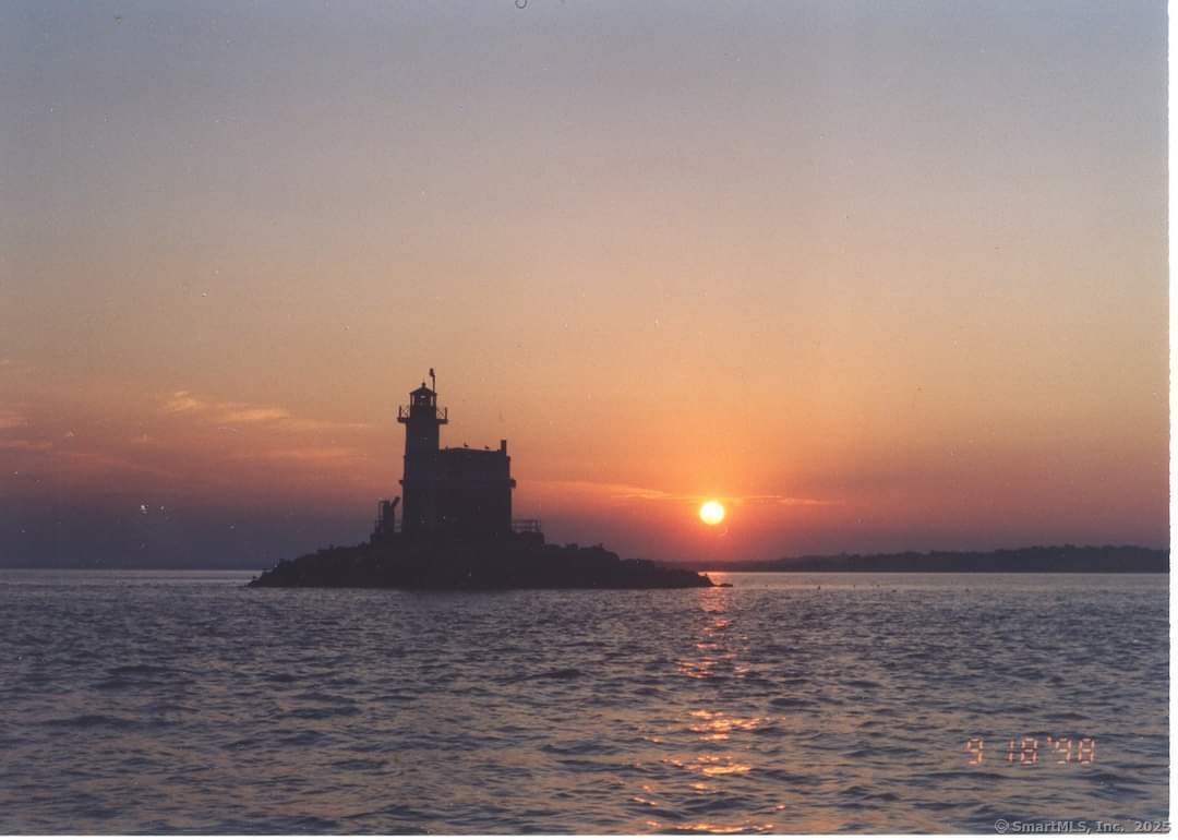 127 Paul Place Fairfield, CT 06824 - Photo 40 of 40 Penfield Lighthouse Sunset.