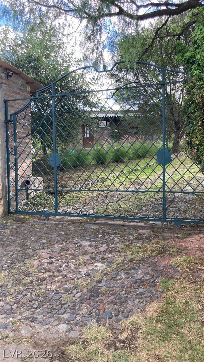970 La Rabija Shermans Dale, OS 17090 - Photo 17 of 18 Ornate wrought iron gates offer a distinguished entry to this verdant, private property.