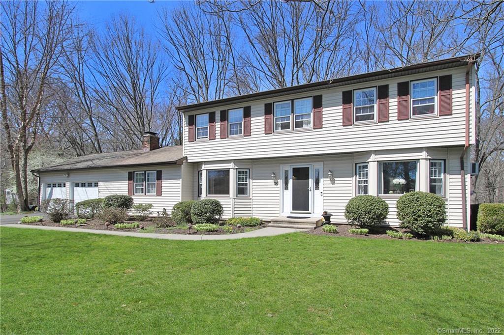 20 Riverbend Road Trumbull, CT 06611 - Photo 1 of 1 a front view of a house with garden
