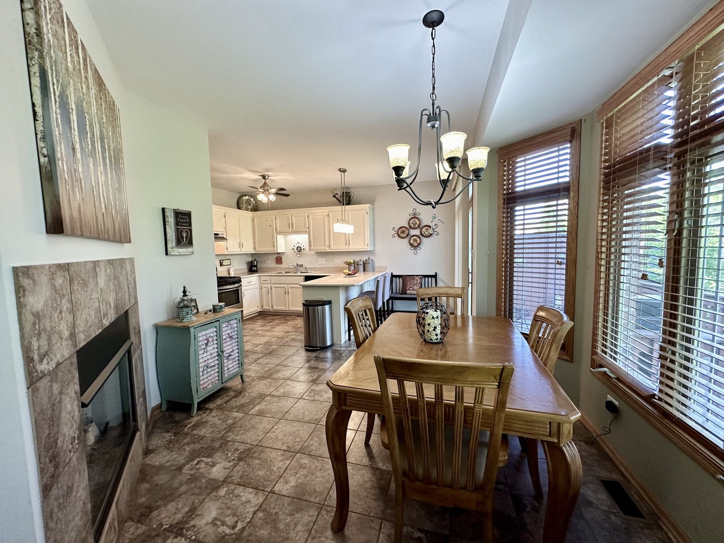 18743 Wren Circle Mokena, IL 60448 - Photo 6 of 25 a view of a dining room with furniture window and wooden floor