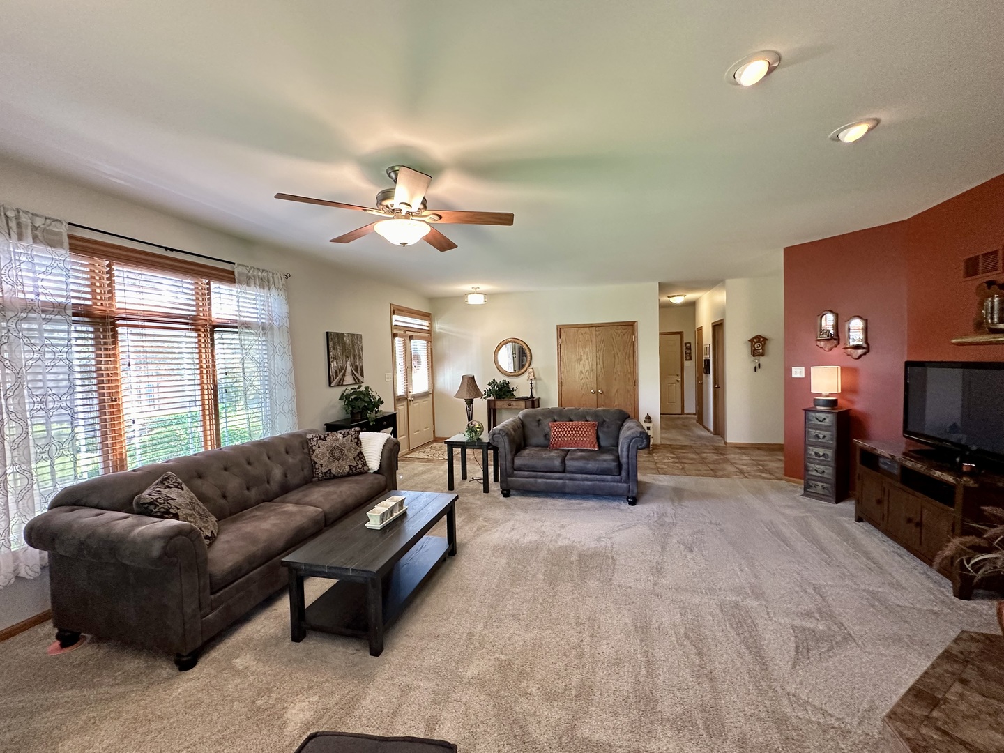18743 Wren Circle Mokena, IL 60448 - Photo 8 of 25 a living room with furniture a large window and a flat screen tv