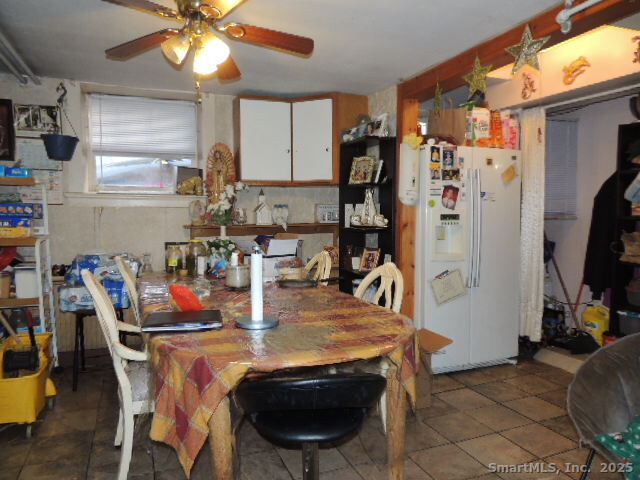 201 Colony Street Meriden, CT 06451 - Photo 6 of 16 a view of a dining room with furniture and a window