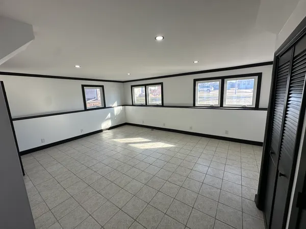 an empty room with windows