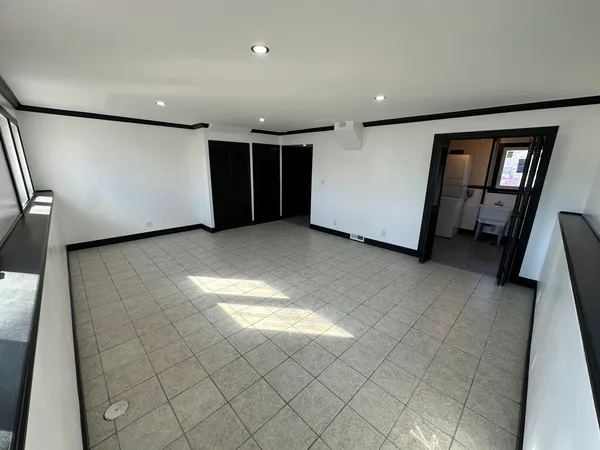 an empty room with windows