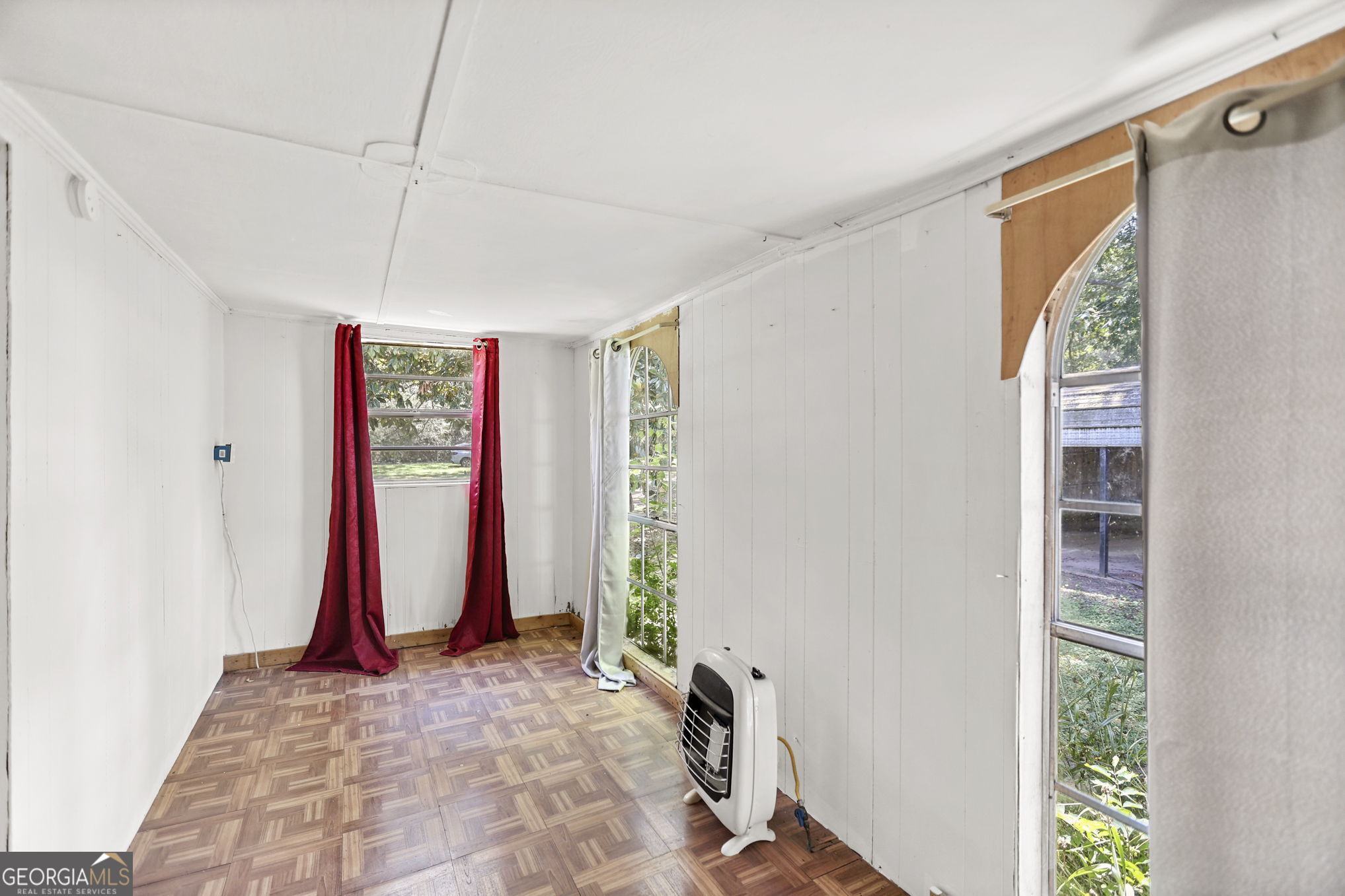 138 Main Street Sharpsburg, GA 30277 - Photo 18 of 34 a view of a room with window and couch