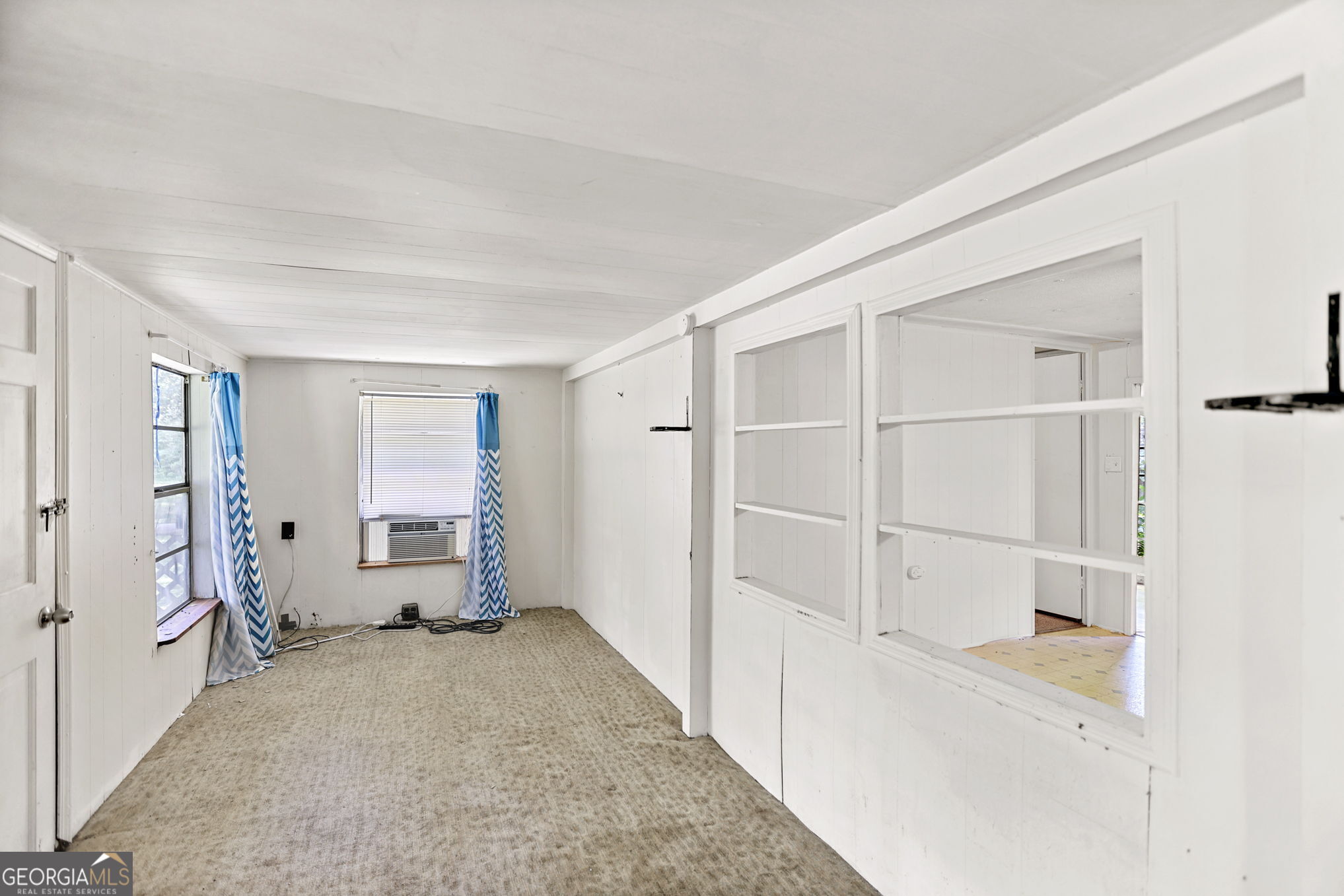 138 Main Street Sharpsburg, GA 30277 - Photo 23 of 34 a view of livingroom with furniture and closet