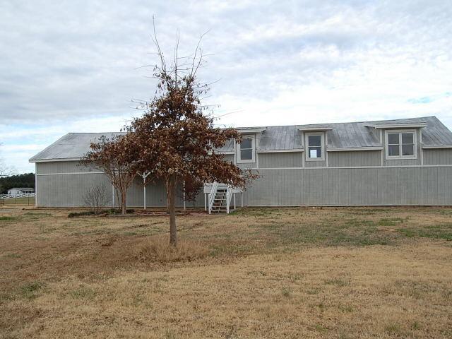 3434 Calvin Road Monticello, GA 31064 - Photo 1 of 1 a view of a house with a backyard