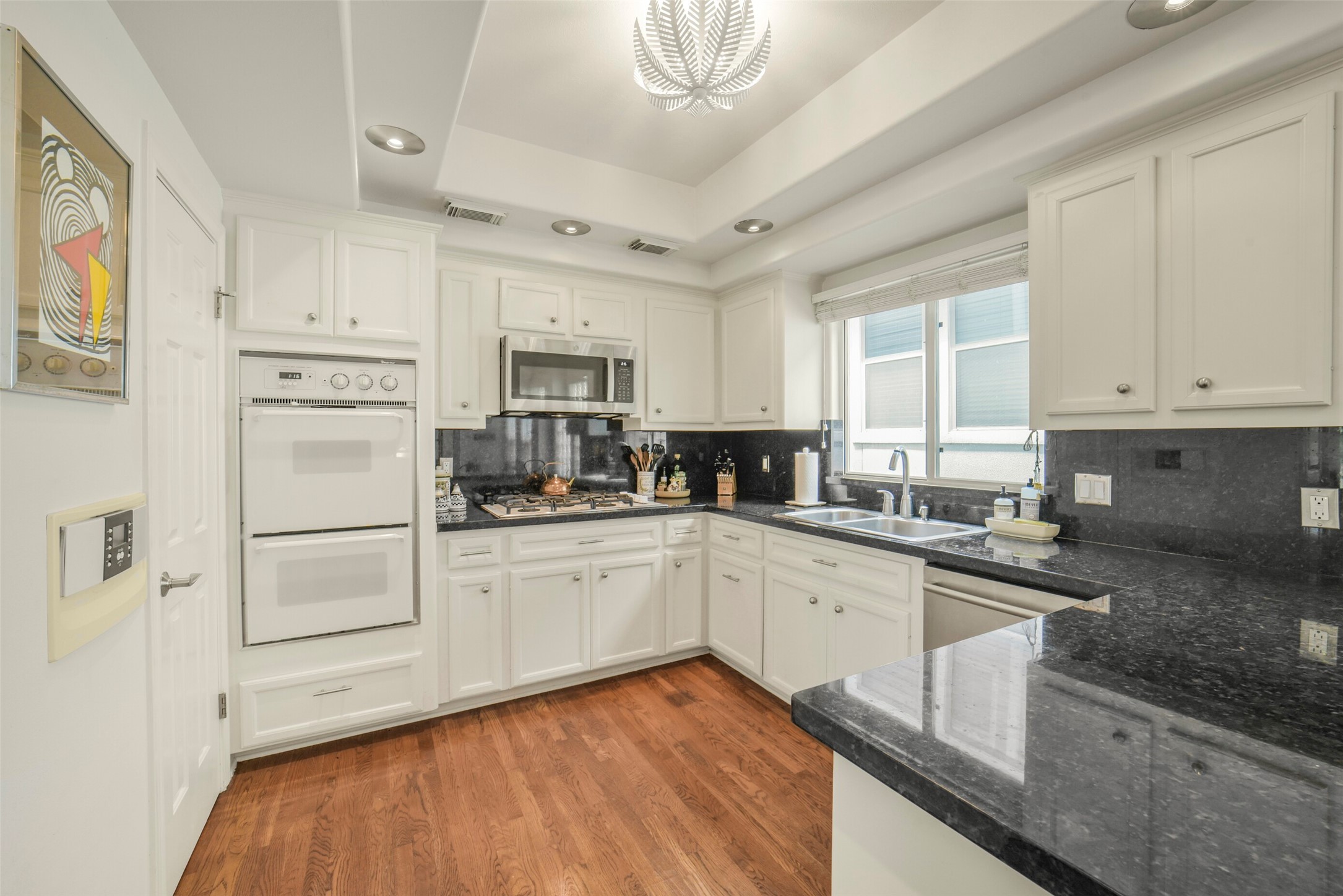 2026 Welch Street Houston, TX 77019 - Photo 8 of 28 updated kitchen lighting