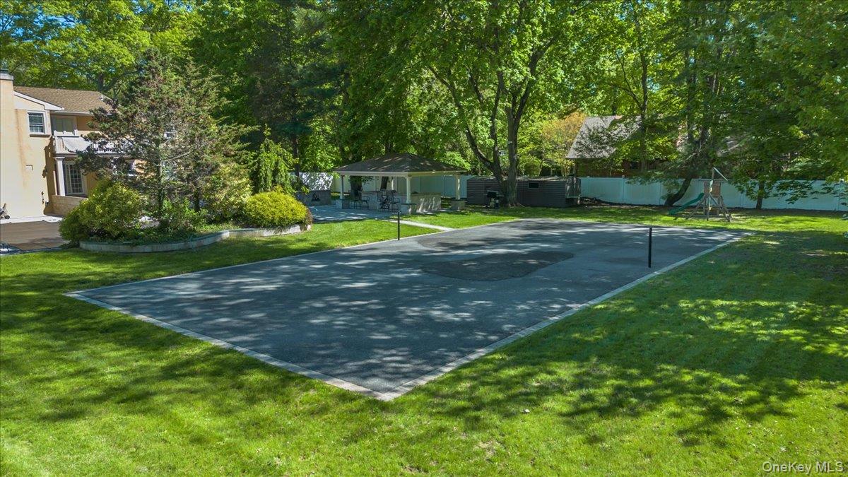 626 Caledonia Road Dix Hills, NY 11746 - Photo 37 of 49 a view of a park with large trees