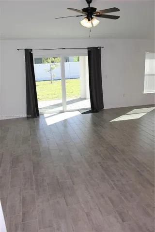 a view of a room that has a window