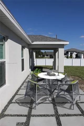 a view of a backyard of a house