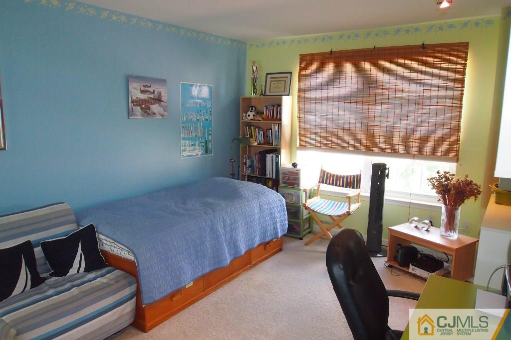 983 Cox Road North Brunswick, NJ 08902 - Photo 14 of 24 a bedroom with a bed and a window