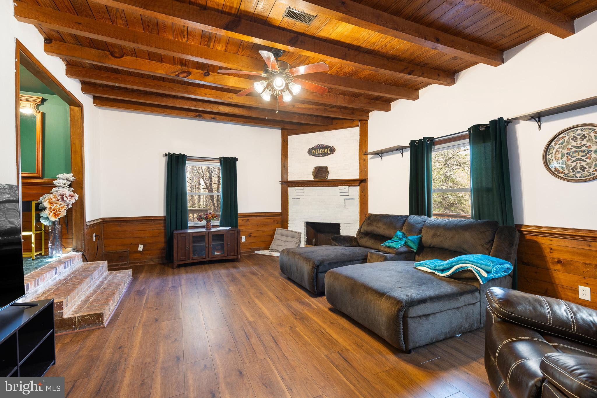 5708 Lakeview Road Quinton, VA 23141 - Photo 12 of 53 a living room with furniture and a large window