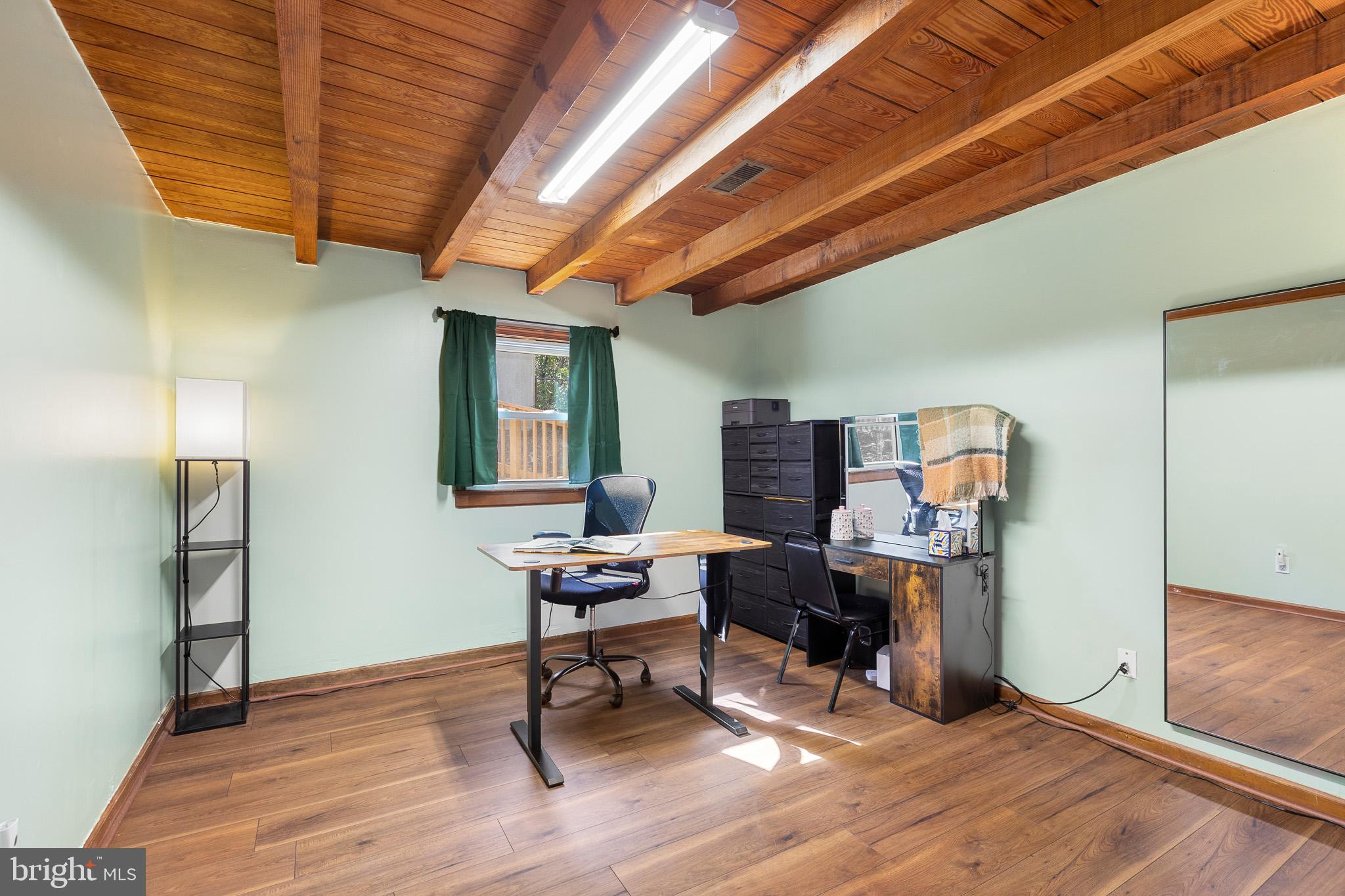 5708 Lakeview Road Quinton, VA 23141 - Photo 21 of 53 a workspace with furniture hardwood and a window