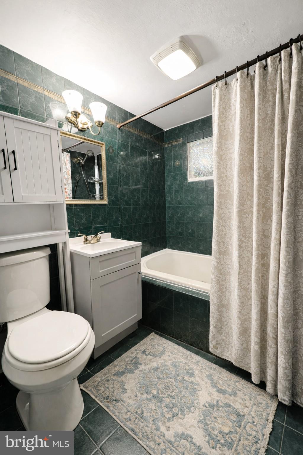 5708 Lakeview Road Quinton, VA 23141 - Photo 23 of 53 a bathroom with a sink toilet and shower