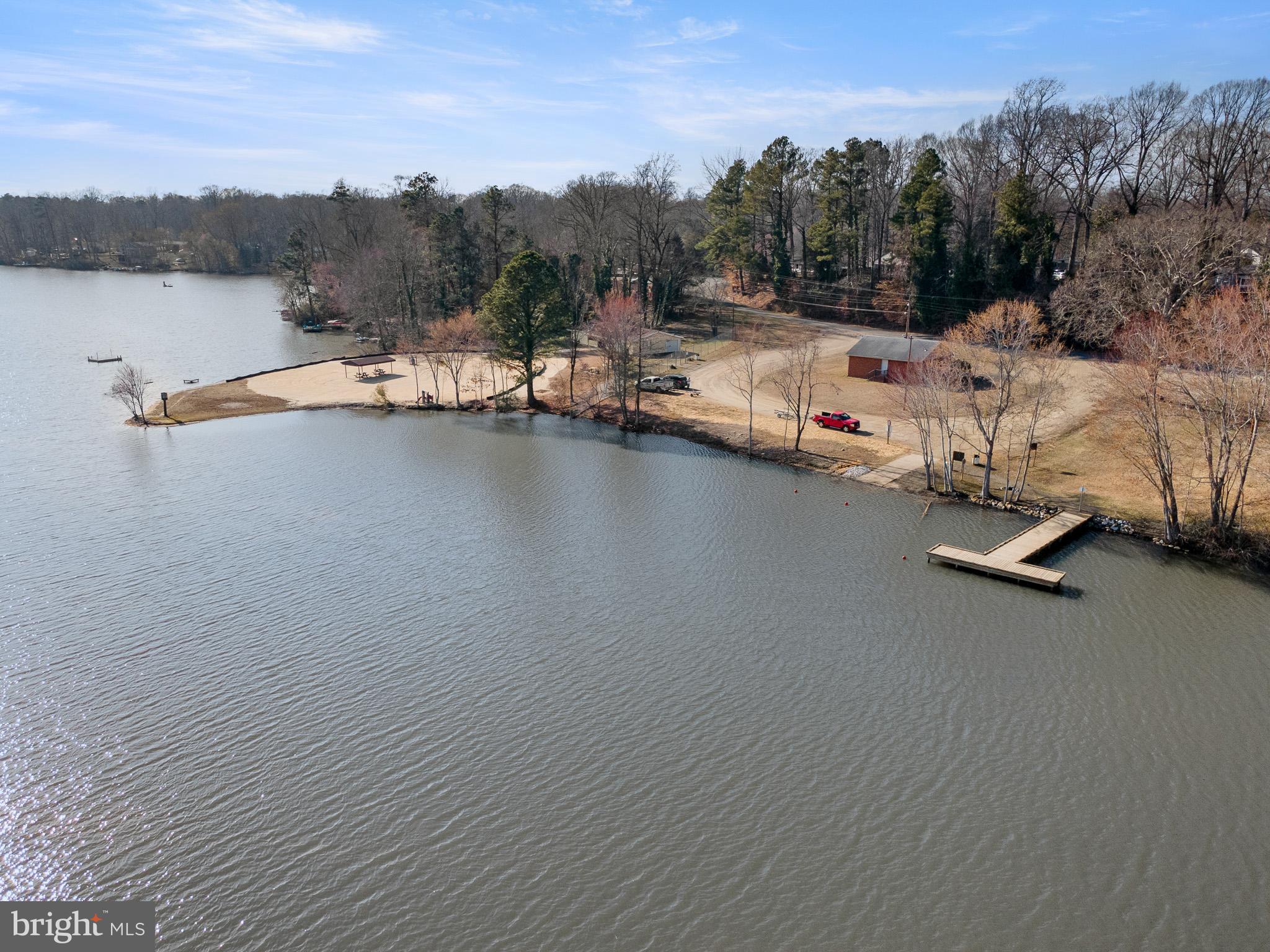 5708 Lakeview Road Quinton, VA 23141 - Photo 32 of 53 a view of a lake with houses