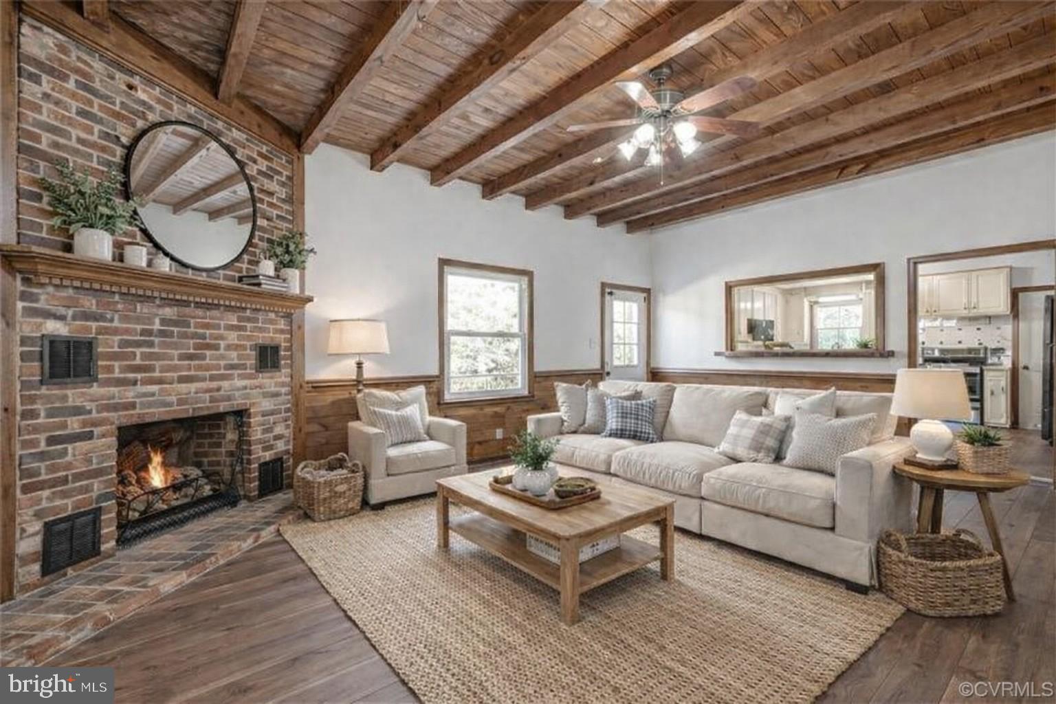 5708 Lakeview Road Quinton, VA 23141 - Photo 45 of 53 a living room with furniture a fireplace and a table