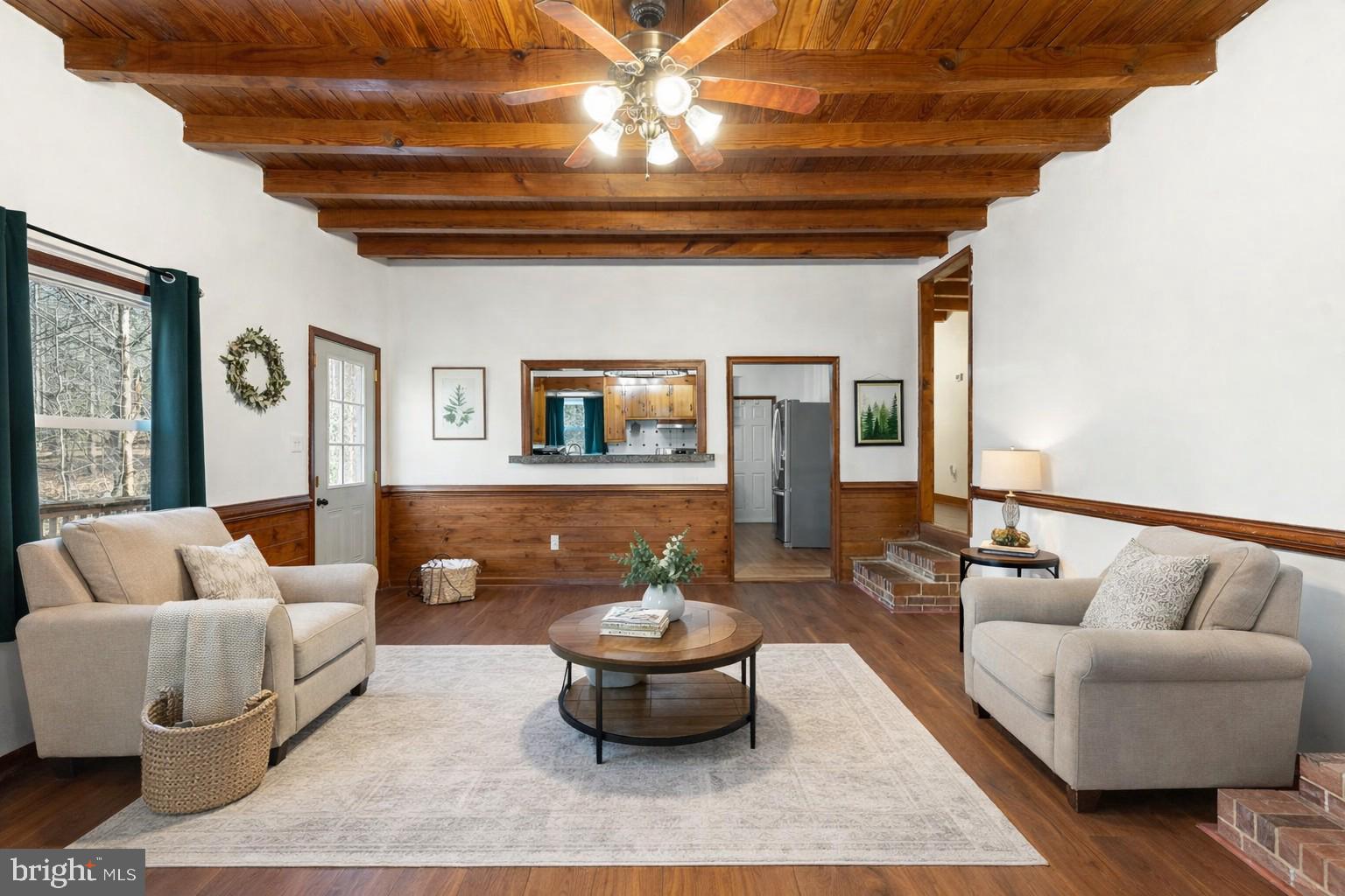 5708 Lakeview Road Quinton, VA 23141 - Photo 7 of 53 a living room with furniture and a chandelier
