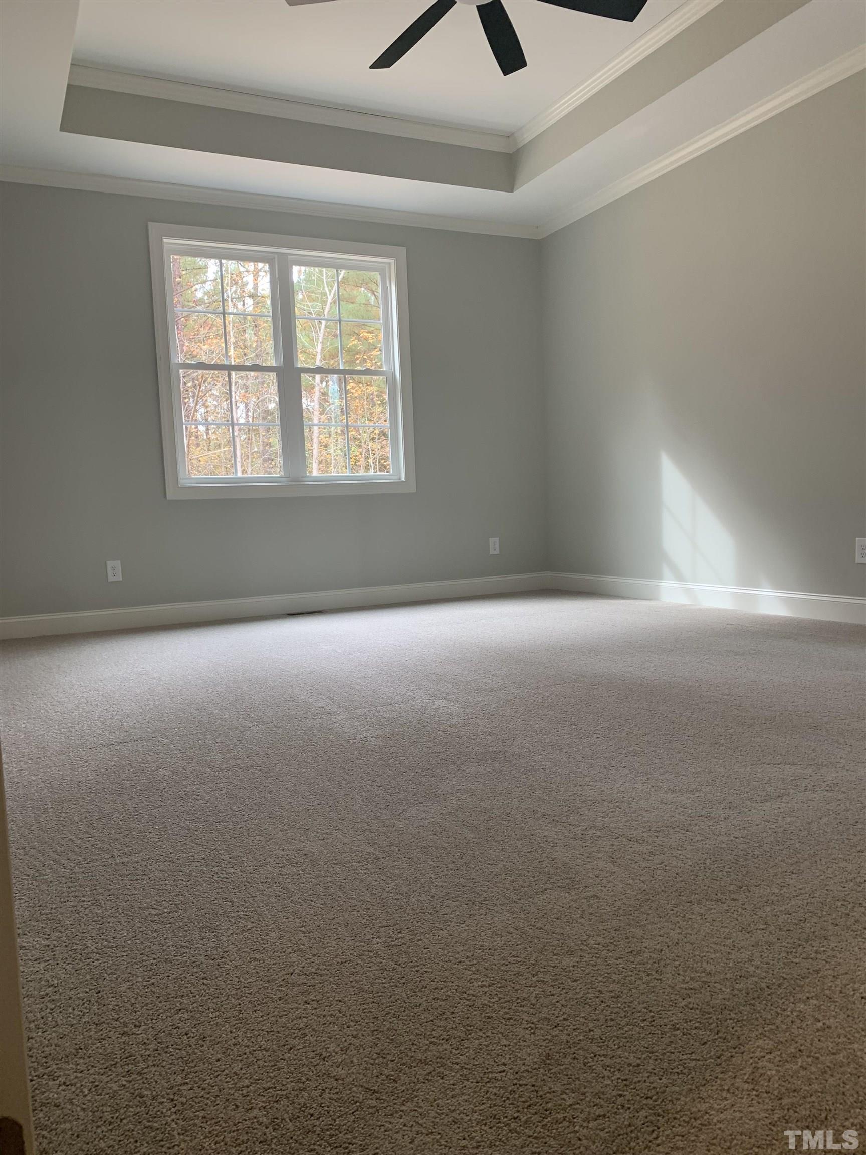 245 Whistlers Cove Louisburg, NC 27549 - Photo 17 of 27 a view of an empty room with a window