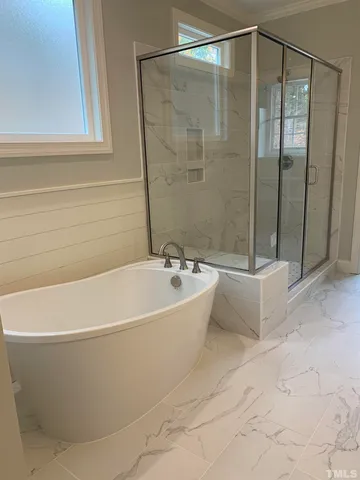 a bathroom with a granite countertop sink a mirror and a vanity