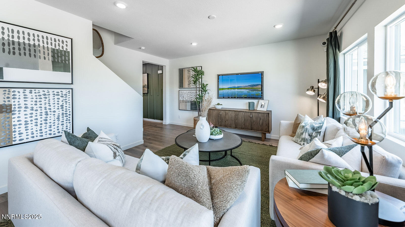 7559 Editor Drive Reno, NV 89506 - Photo 7 of 22 a living room with furniture and a potted plant