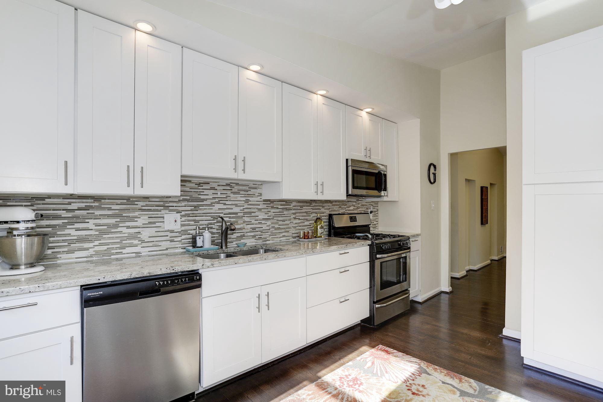 5404 Lightning View Road Columbia, MD 21045 - Photo 9 of 30 Gourmet kitchen with elegant cabinet downlighting