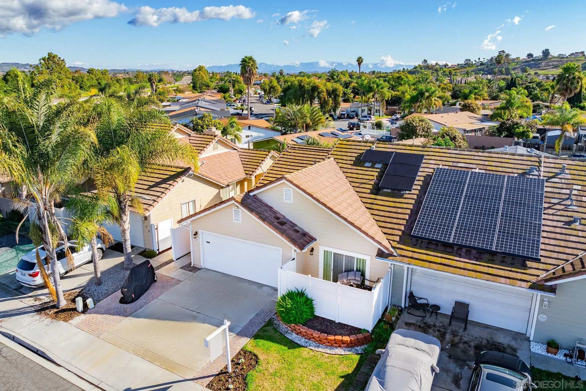 325 Wind Flower Way Oceanside, CA 92057 - Photo 2 of 41 a view of a swimming pool with outdoor seating and a terrace