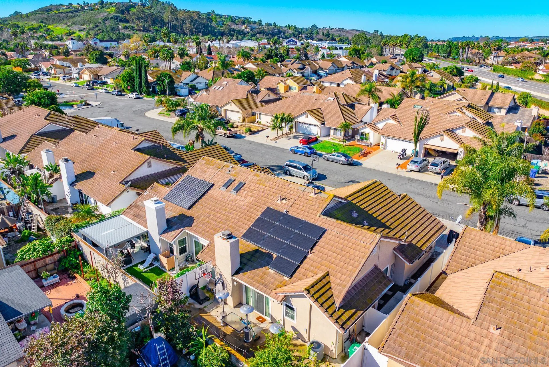 325 Wind Flower Way Oceanside, CA 92057 - Photo 39 of 41 an aerial view of a houses with a lake view