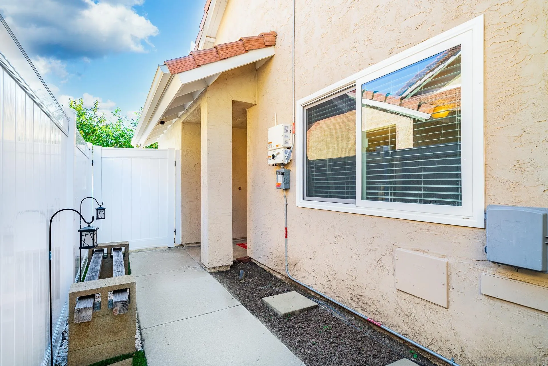 325 Wind Flower Way Oceanside, CA 92057 - Photo 7 of 41 a house view with a outdoor space