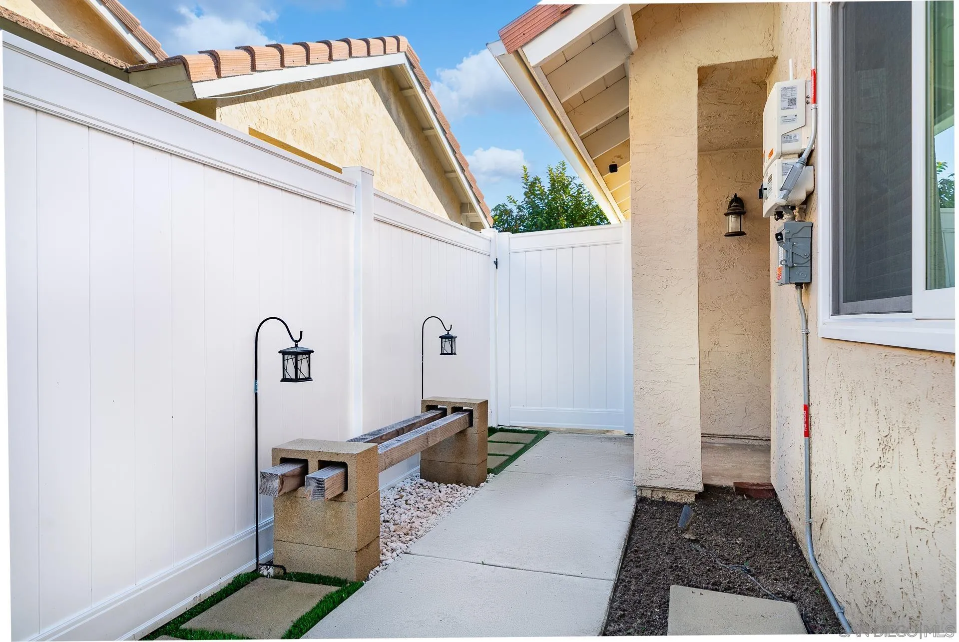 325 Wind Flower Way Oceanside, CA 92057 - Photo 8 of 41 a view of a front door of the house