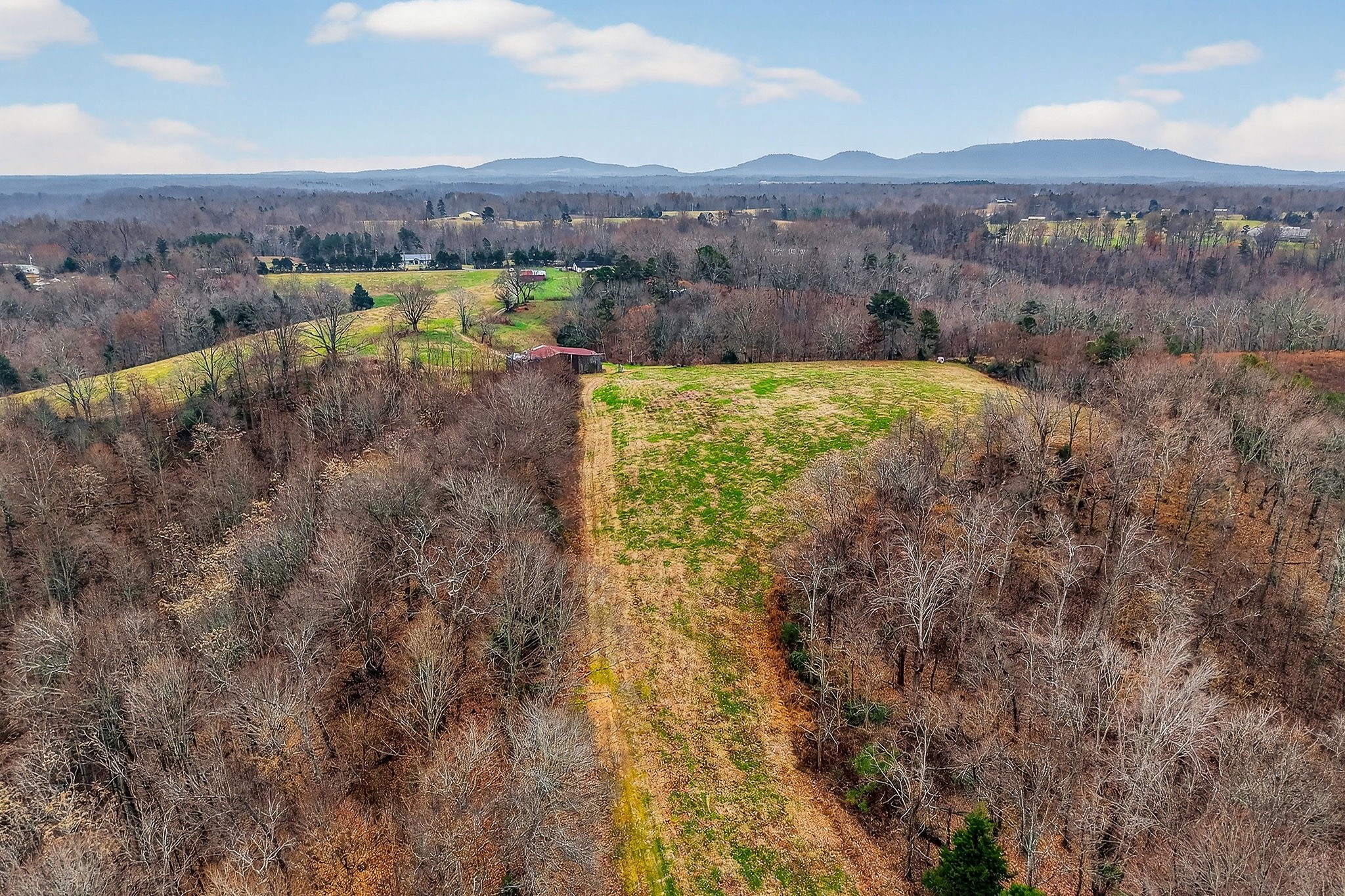2578 Pea Ridge Road Liberty, TN 37095 - Photo 18 of 48 a view of a lake with mountains in the background