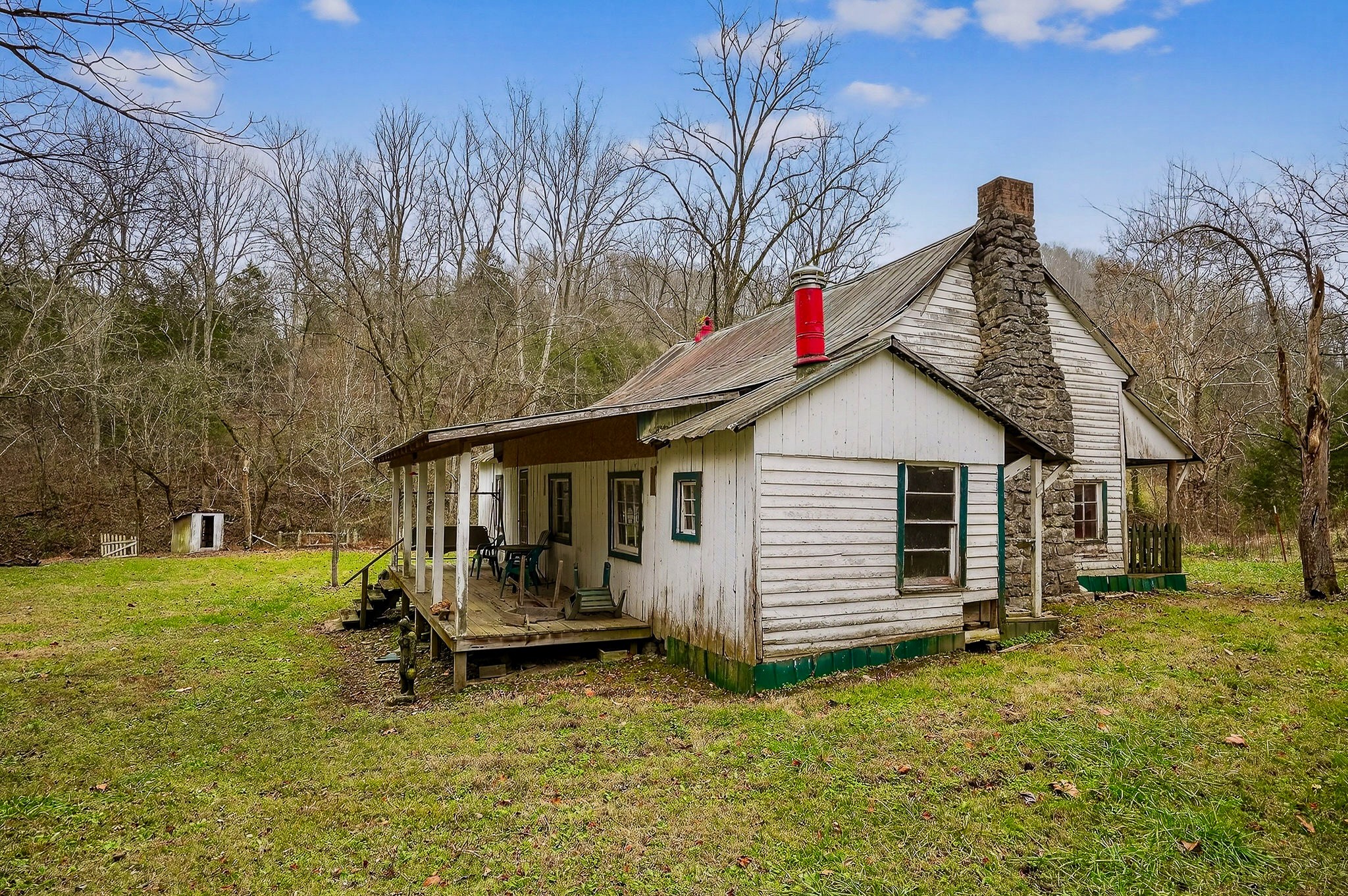 2578 Pea Ridge Road Liberty, TN 37095 - Photo 34 of 48 a view of a house with a yard patio and fire pit