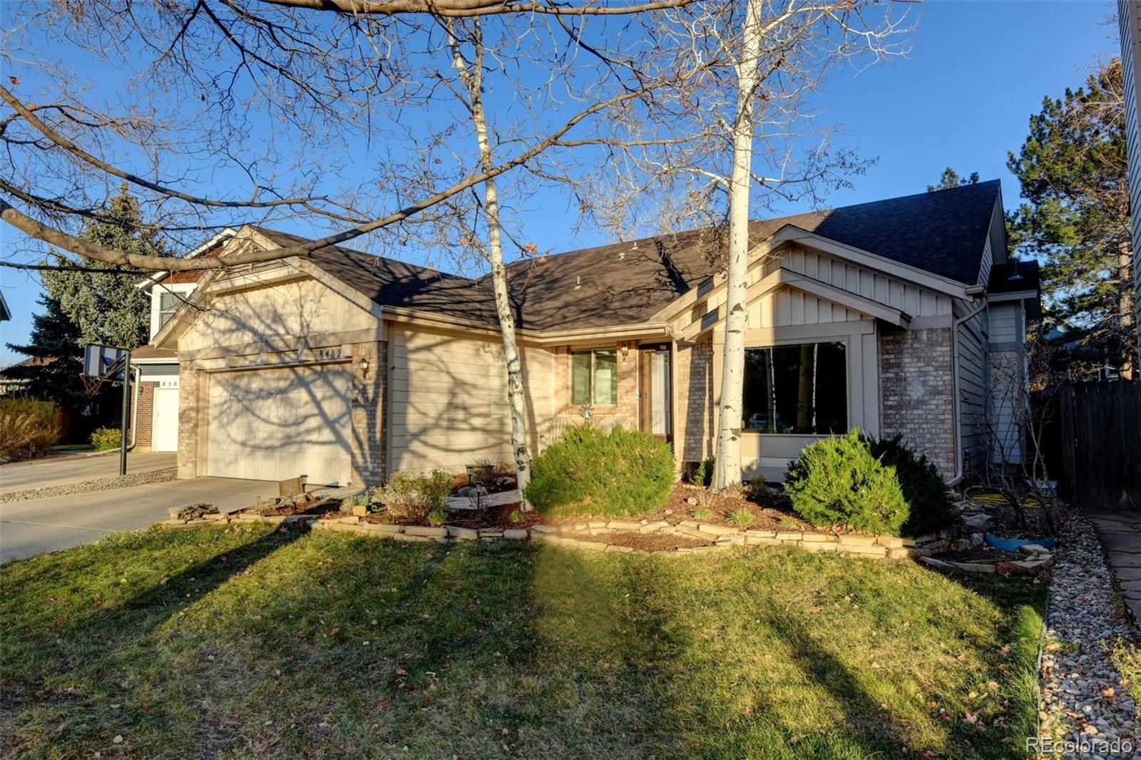 8482 Oak Street Arvada, CO 80005 - Photo 2 of 34 a view of backyard of the house