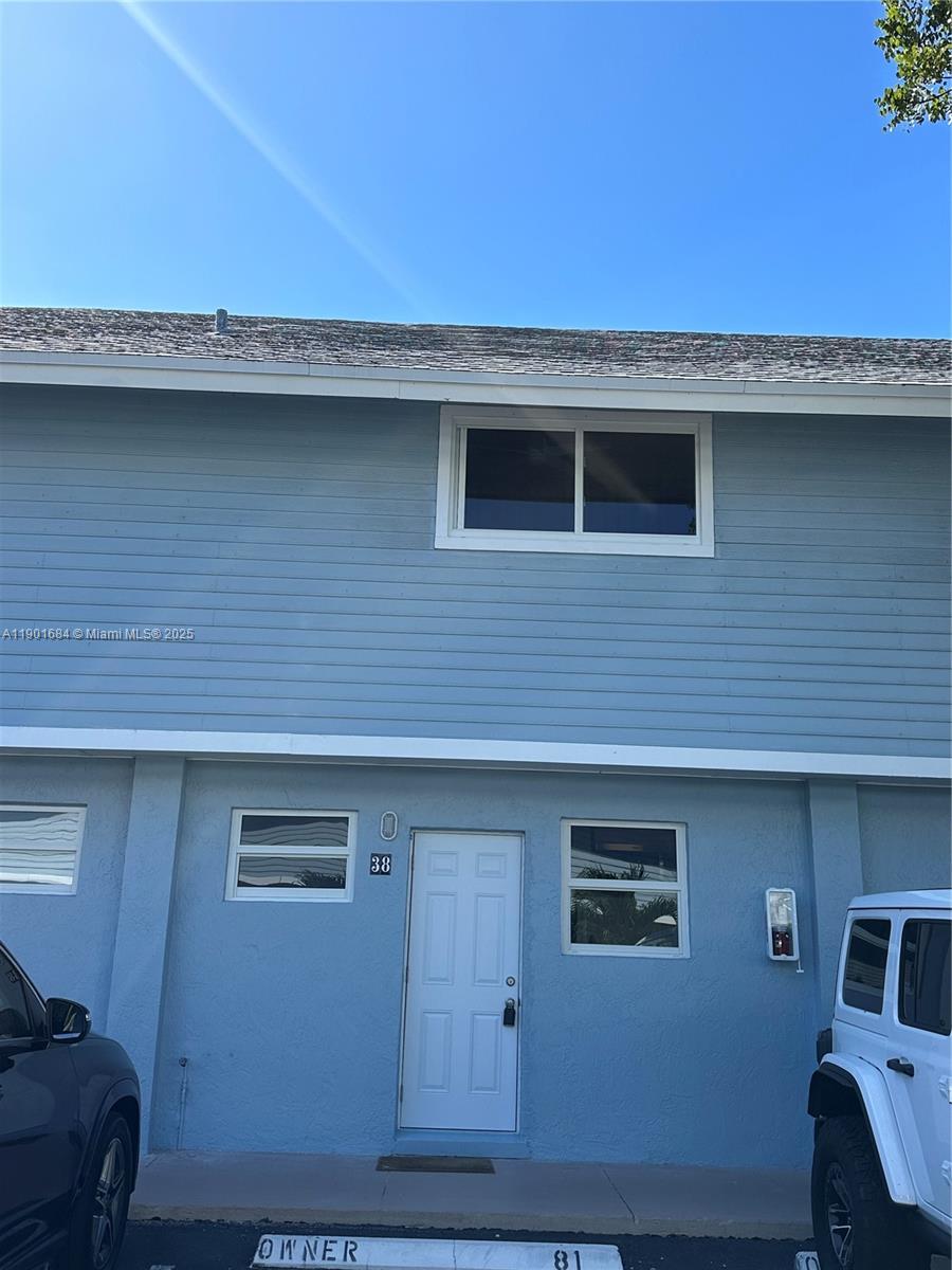 798 Crandon Boulevard, Unit 38C Key Biscayne, FL 33149 - Photo 2 of 33 a view of a house with a space