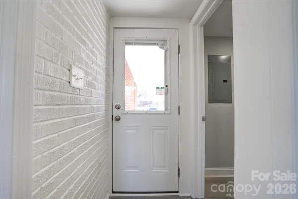 a view of front door with hallway