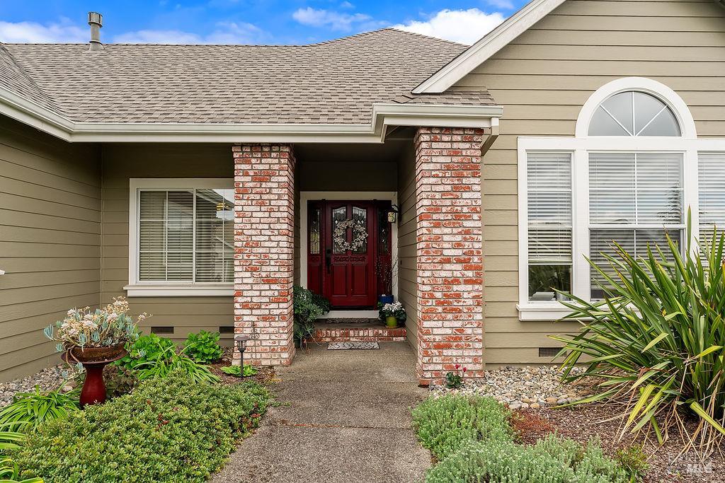 6252 Meadowstone Drive Santa Rosa, CA 95409 - Photo 3 of 33 a front view of a house with a garden
